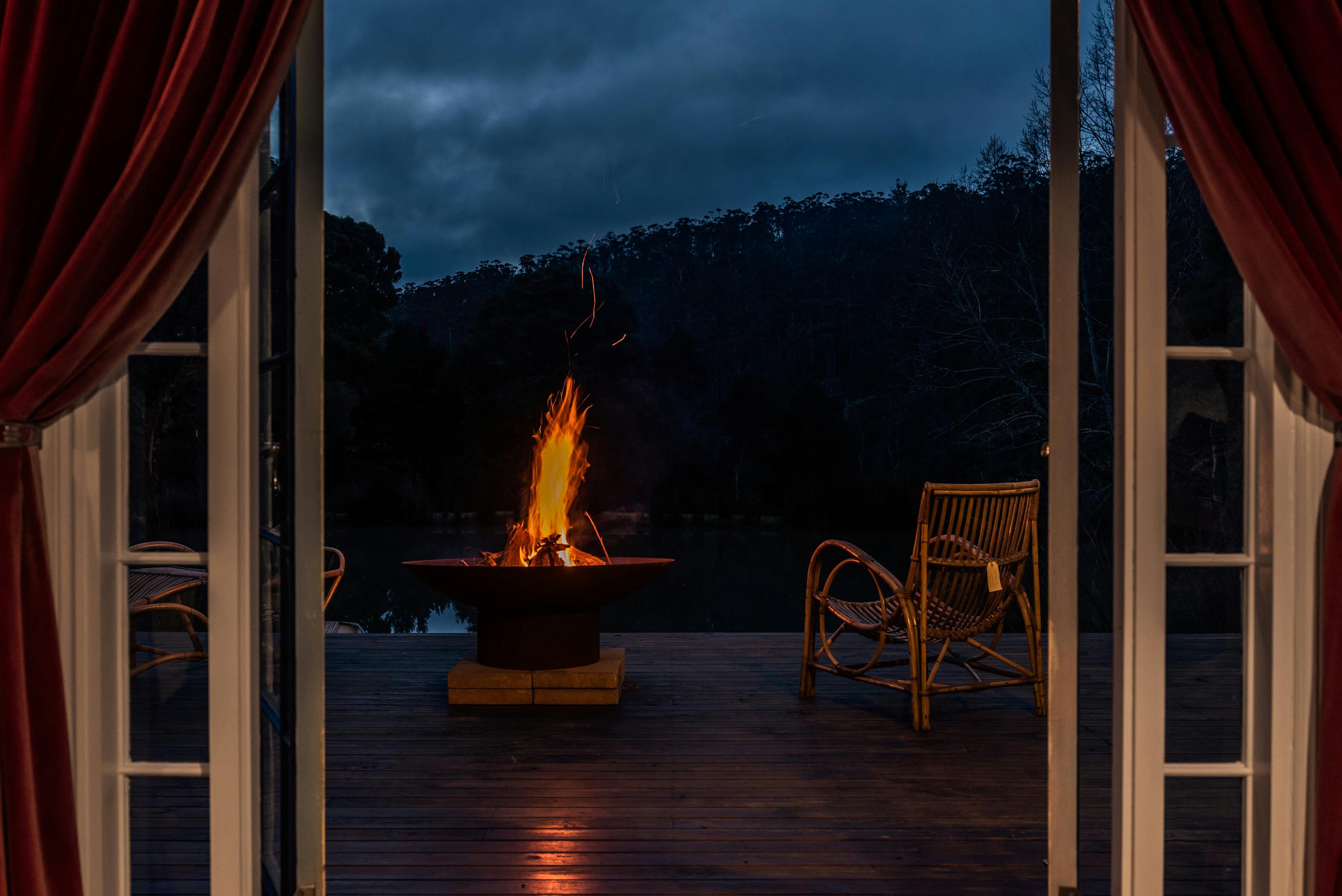 Enjoy the flames from  the fire pit, magical at night under a starry sky