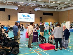 People talking to exhibitors