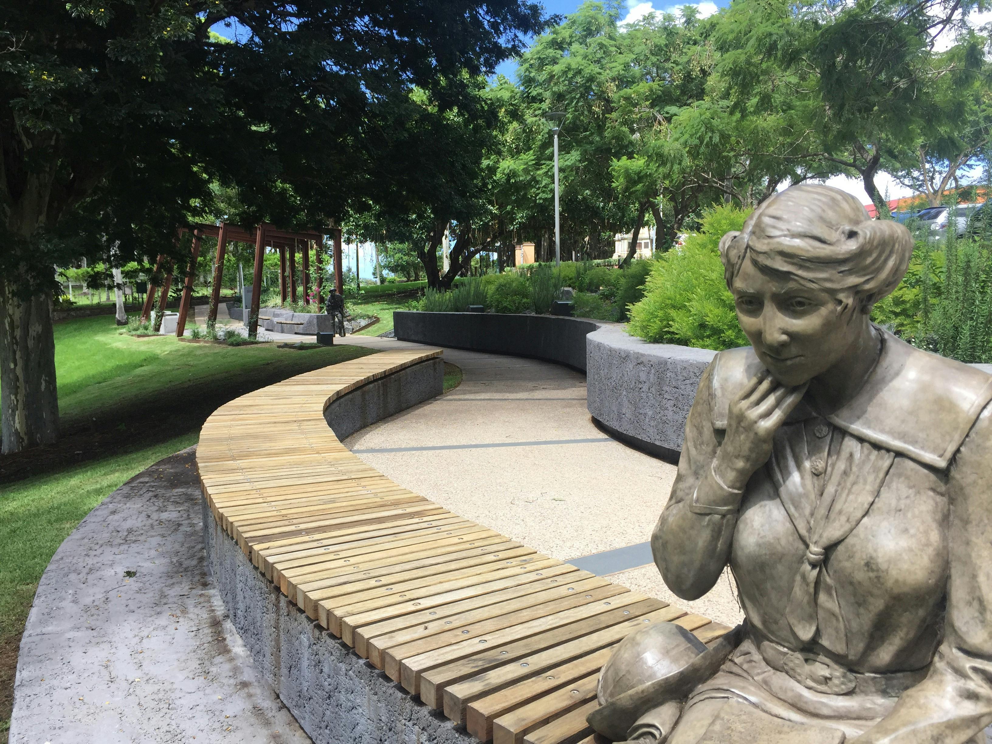 Photo depicting woman in thought as part of Walk of the Anzacs at Queens Park Maryborough