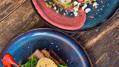 plates of food on a table at Wildflour Canberra