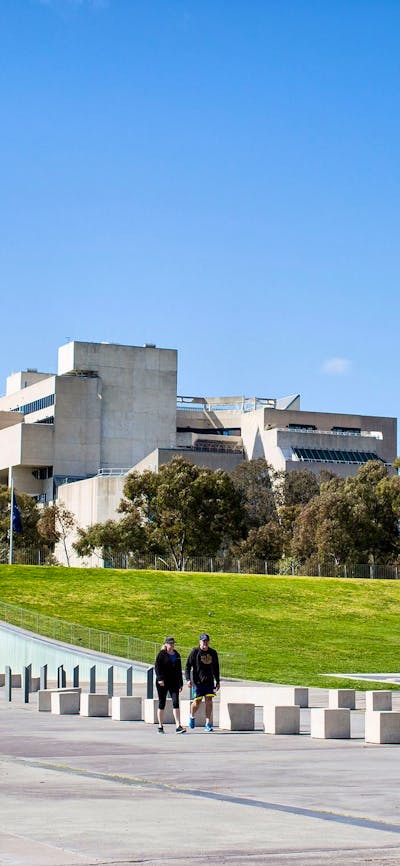International Flag Display with the High Court of Australia in the background