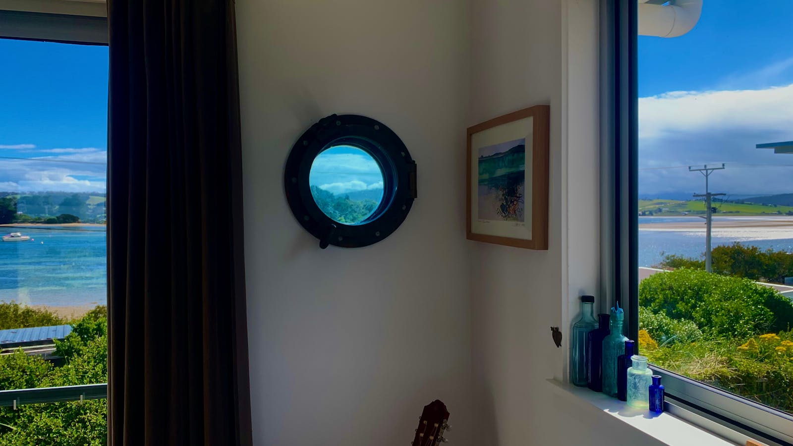 Looking through the porthole to Pipe Clay Lagoon