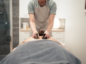 Therapist performing massage