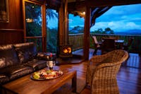 Lit fireplace, with a view of mountains behind.