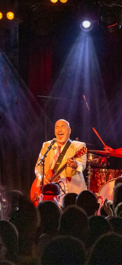 Picture of Black Sorrows performing live on stage