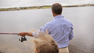 Male fishing at Pejar Dam