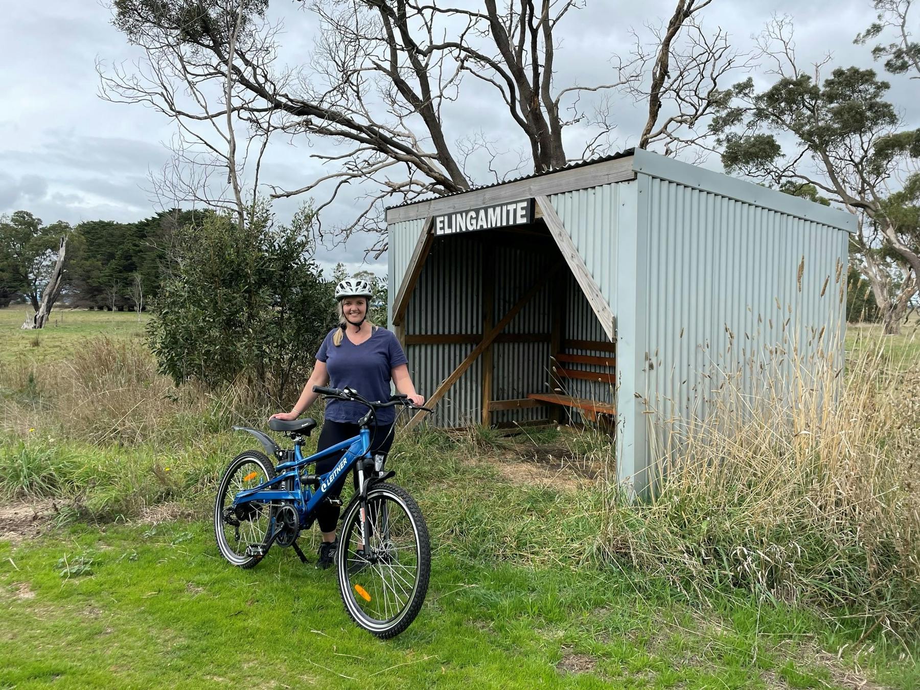 Standing with ebike in Elingamite on the Camperdown to Timboon Rail Trail
