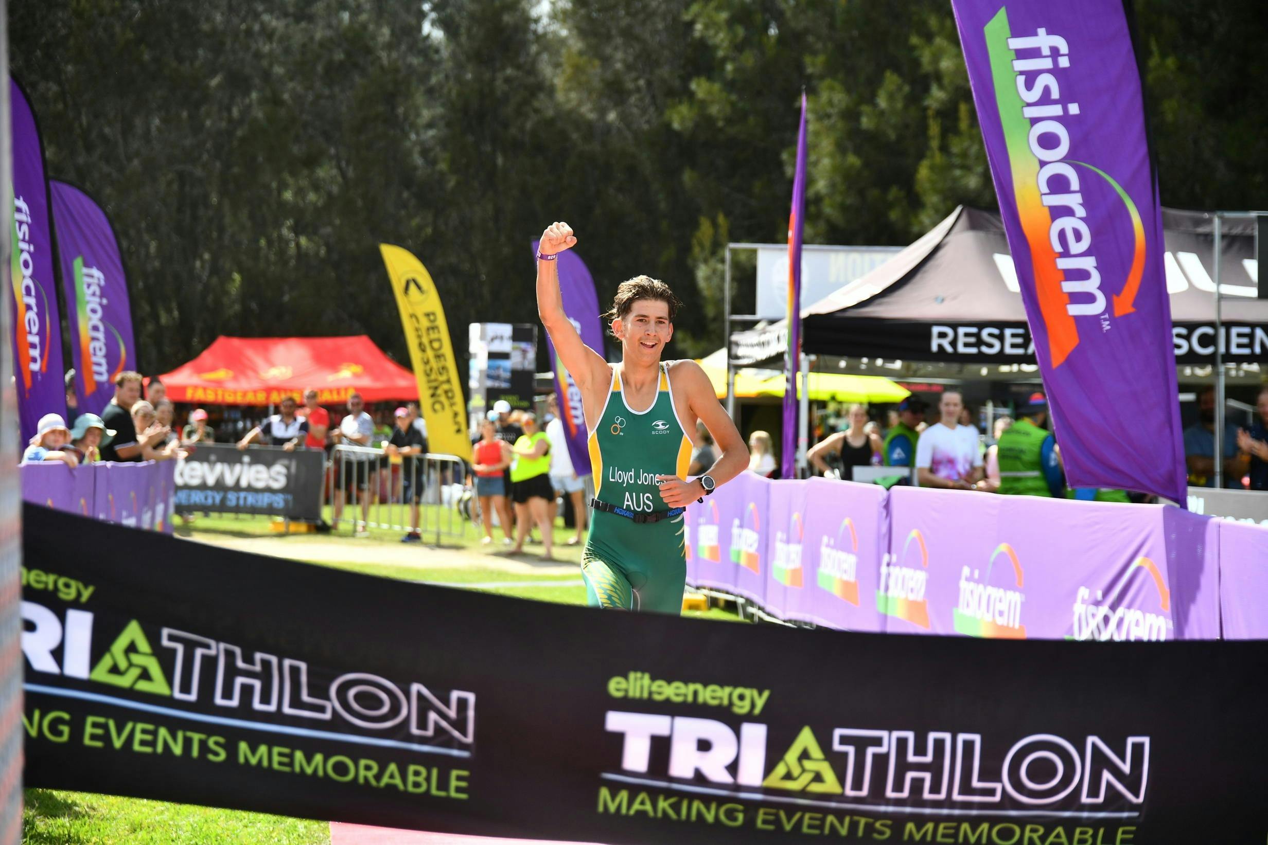 athlete crossing finish line