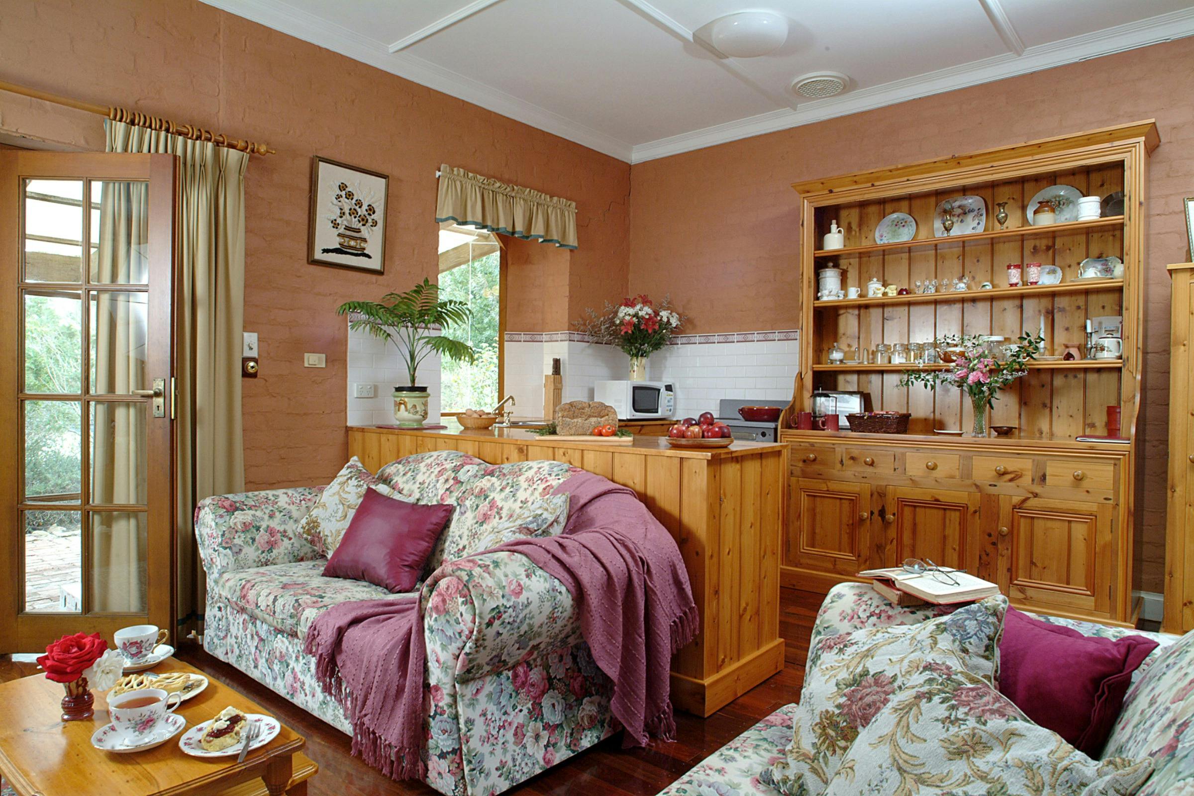 Kitchen/dining/living features a sideboard made from original 1899 Baltic Pine.
