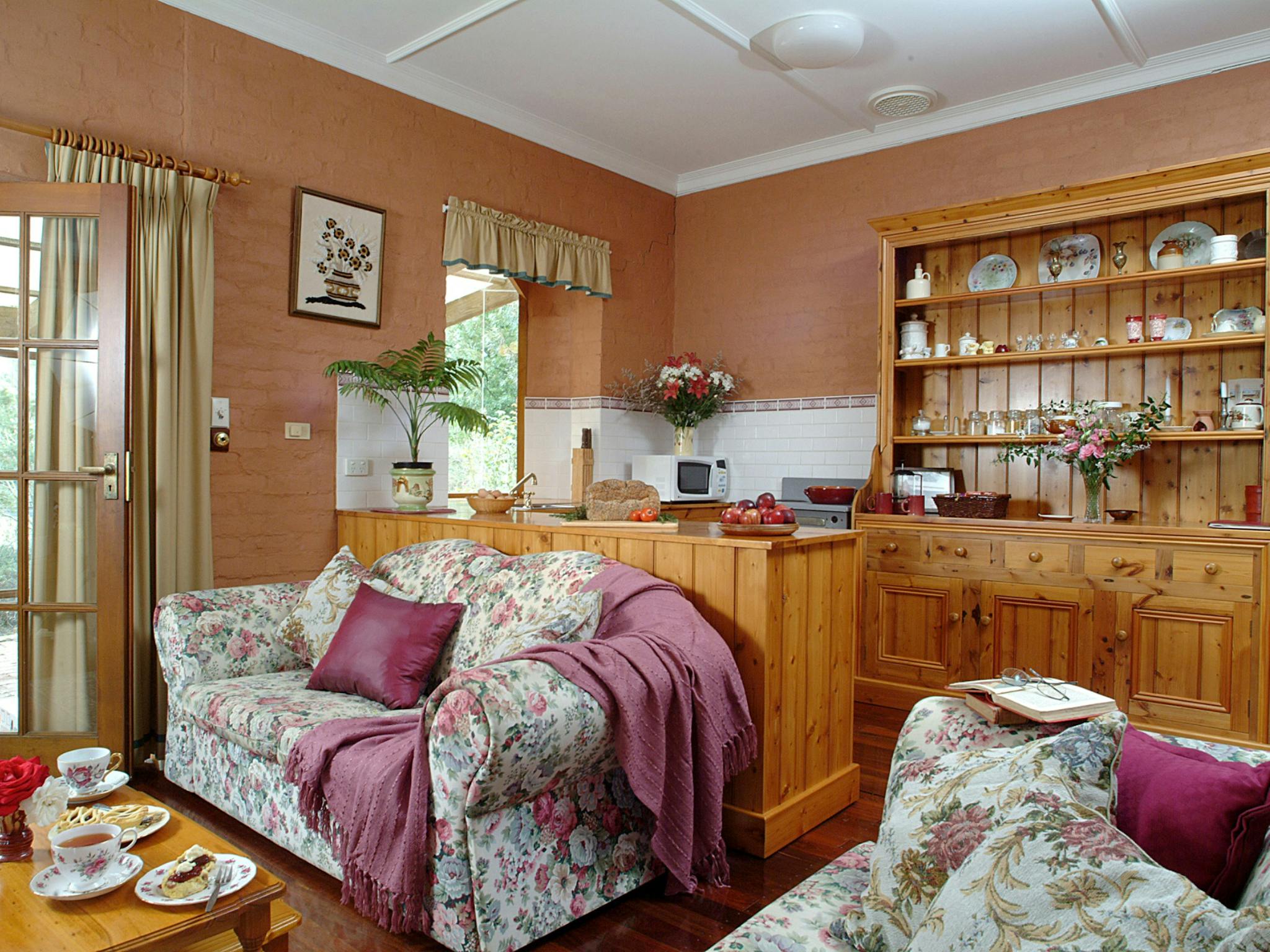 Kitchen/dining/living features a sideboard made from original 1899 Baltic Pine.