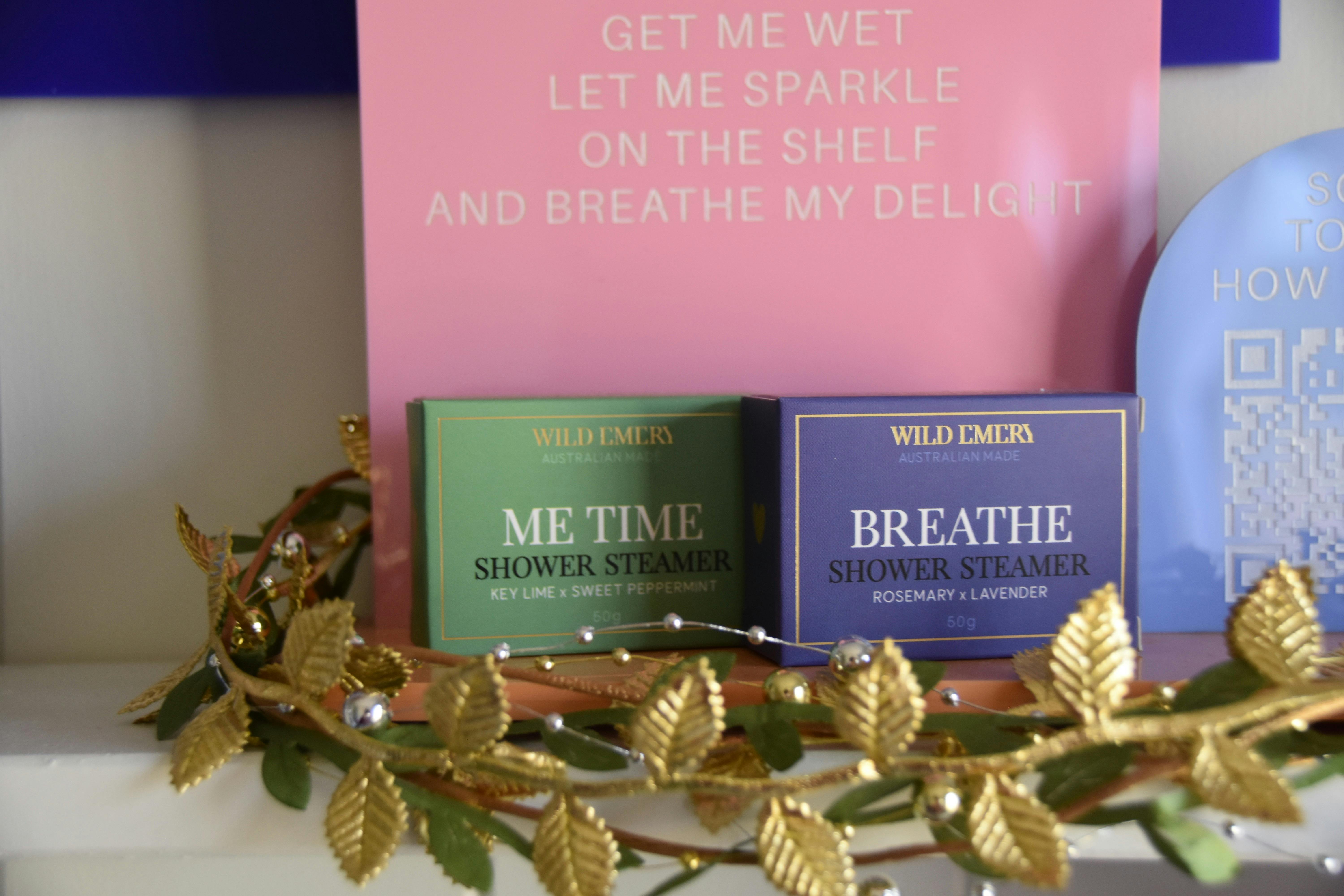Wild Emery shower steamers displayed on a shelf in Ceri’s bathroom