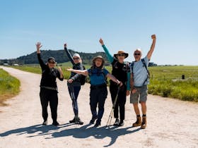 Aussie Camino walkers on a limestone road