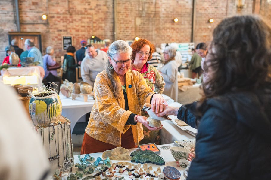 people at the market stall