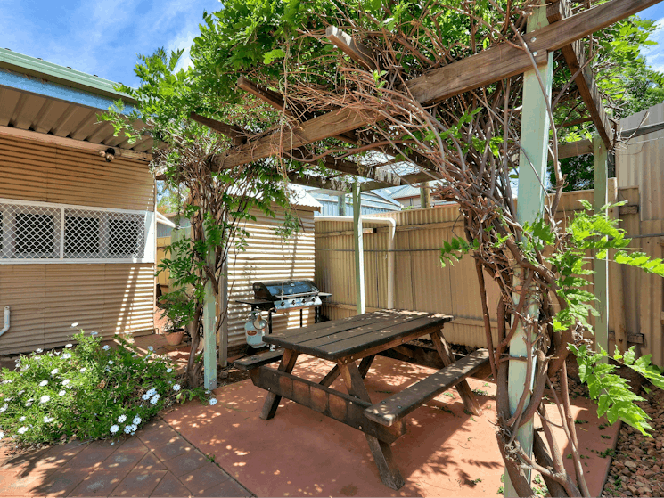A gas BBQ is provided to enjoy a BBQ meal in the undercover shaded patio area