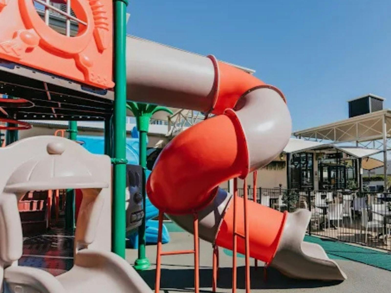colourful outdoor kids playground and slide at the venue