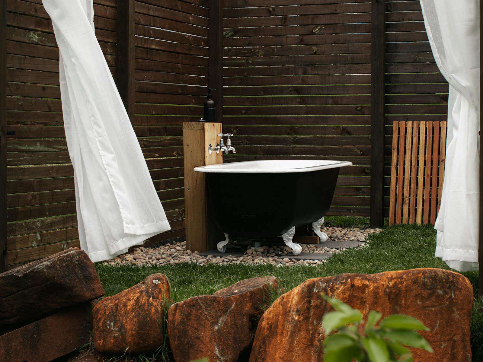 Antique clawfoot bath in our open air bath house