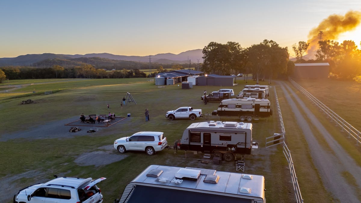 RVs parked up with sunset in background in Mackay Region