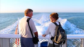 A couple of tourists on the ferry to the Tiwi Islands