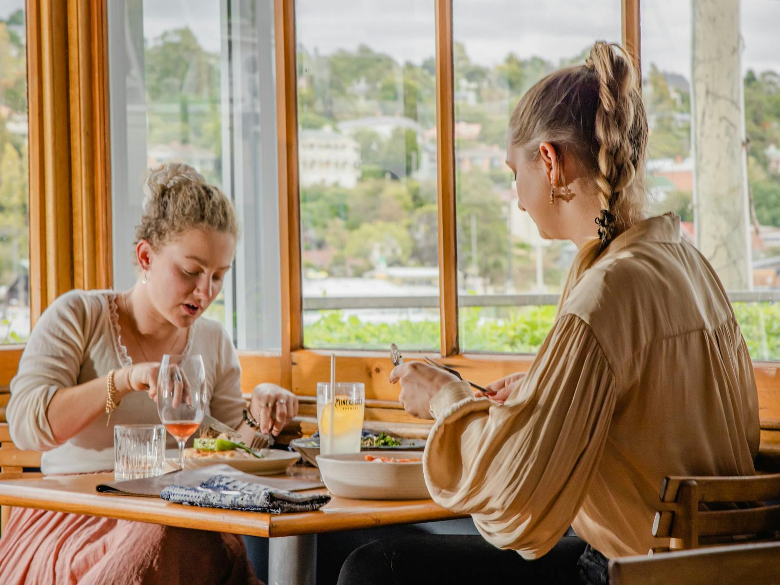 Two people dining inside at Boatyard Launceston