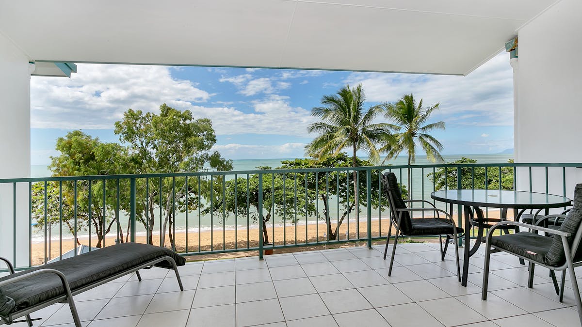 Large private balcony opening to the sea breezes.