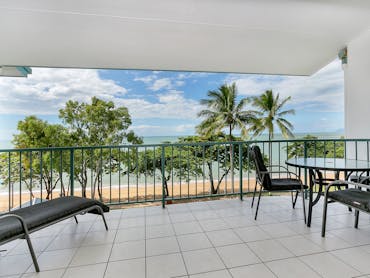 Large private balcony opening to the sea breezes.