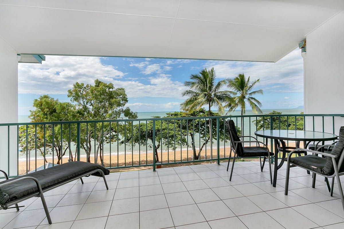 Large private balcony opening to the sea breezes.