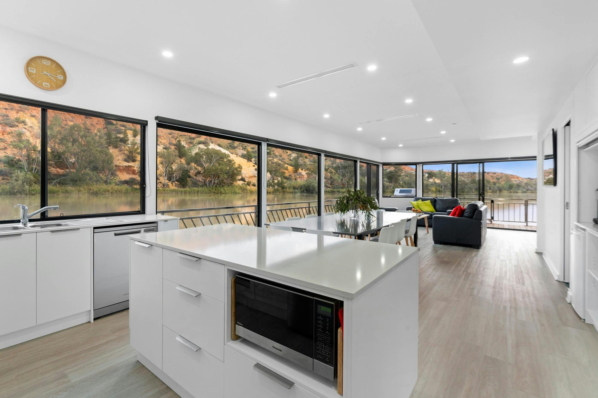 interior of luxury houseboat looking from kitchen to living area