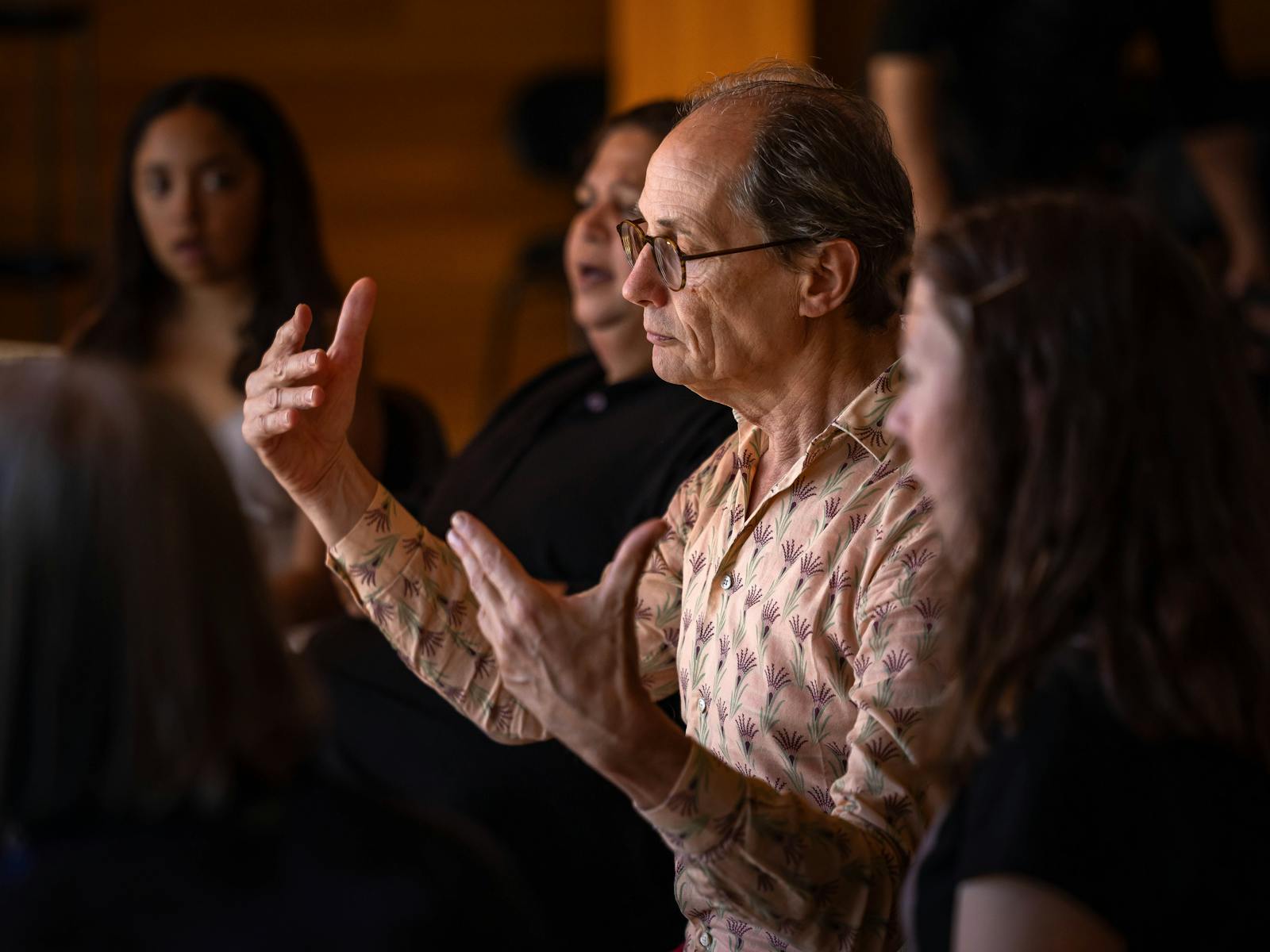 A man conducts a choir