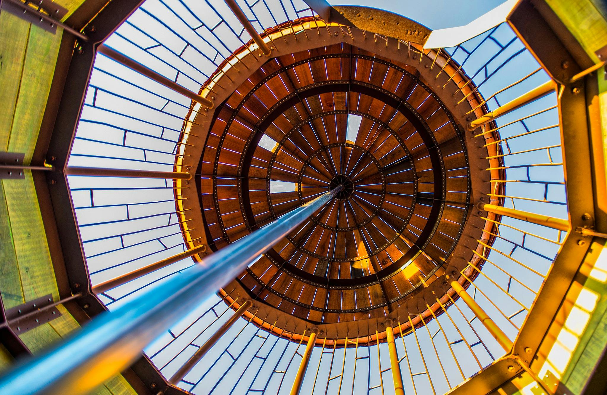 looking up from inside a playground acorn pod to see feature roof