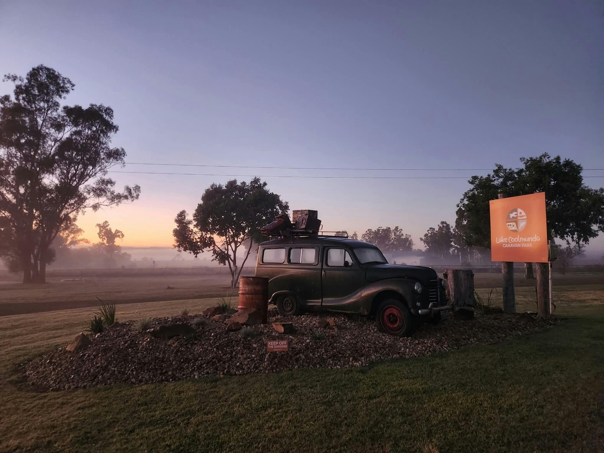 Austin A40 with sunrise behind