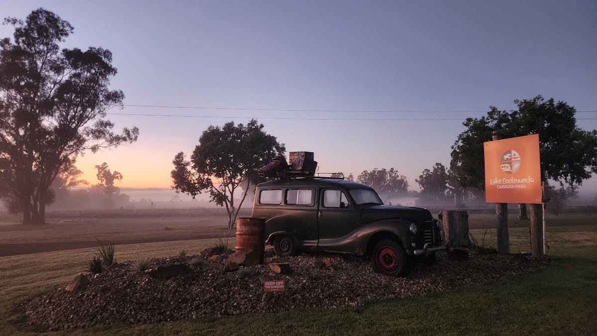 Austin A40 with sunrise behind