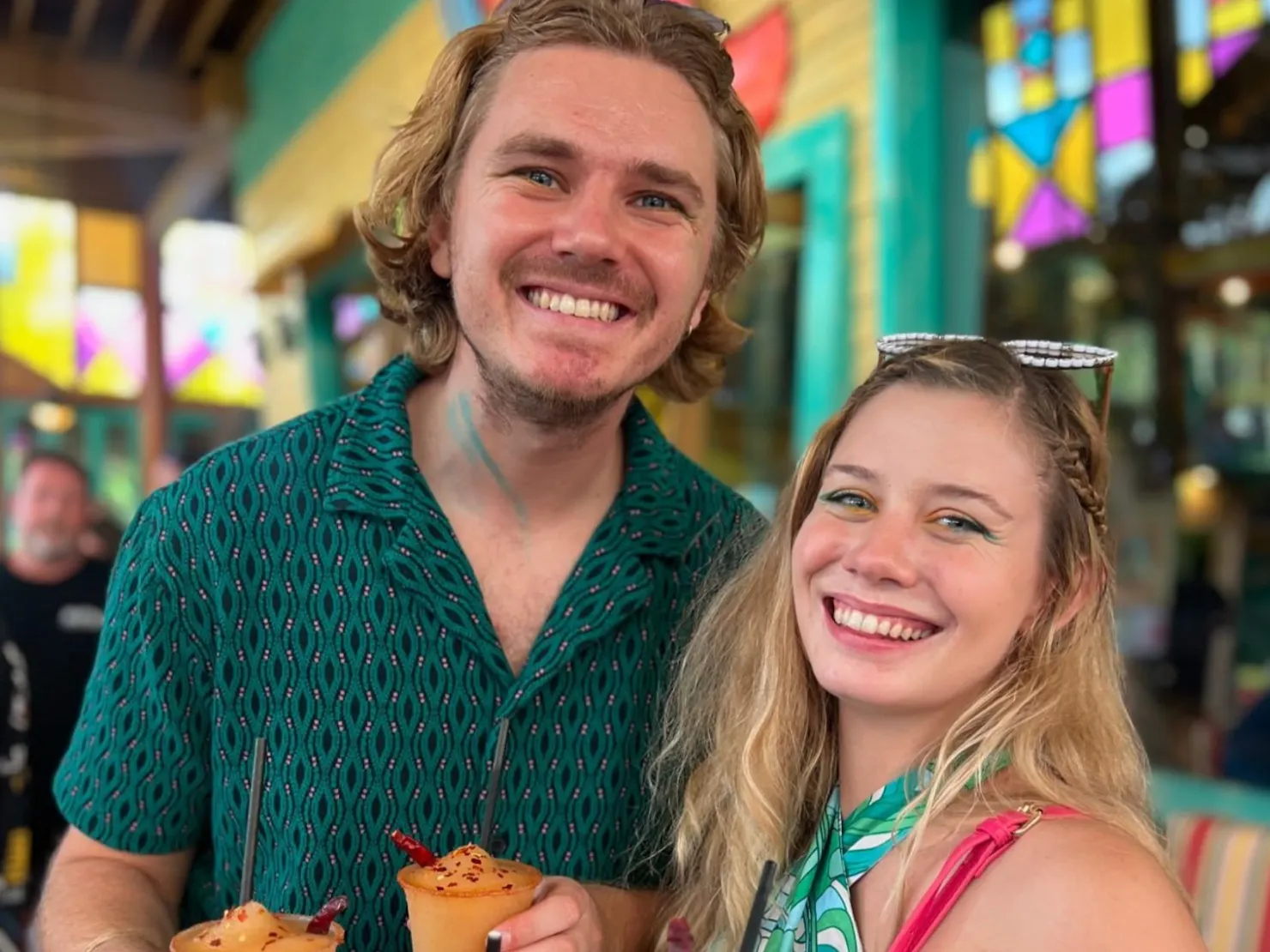 Two people enjoying some refreshing drinks