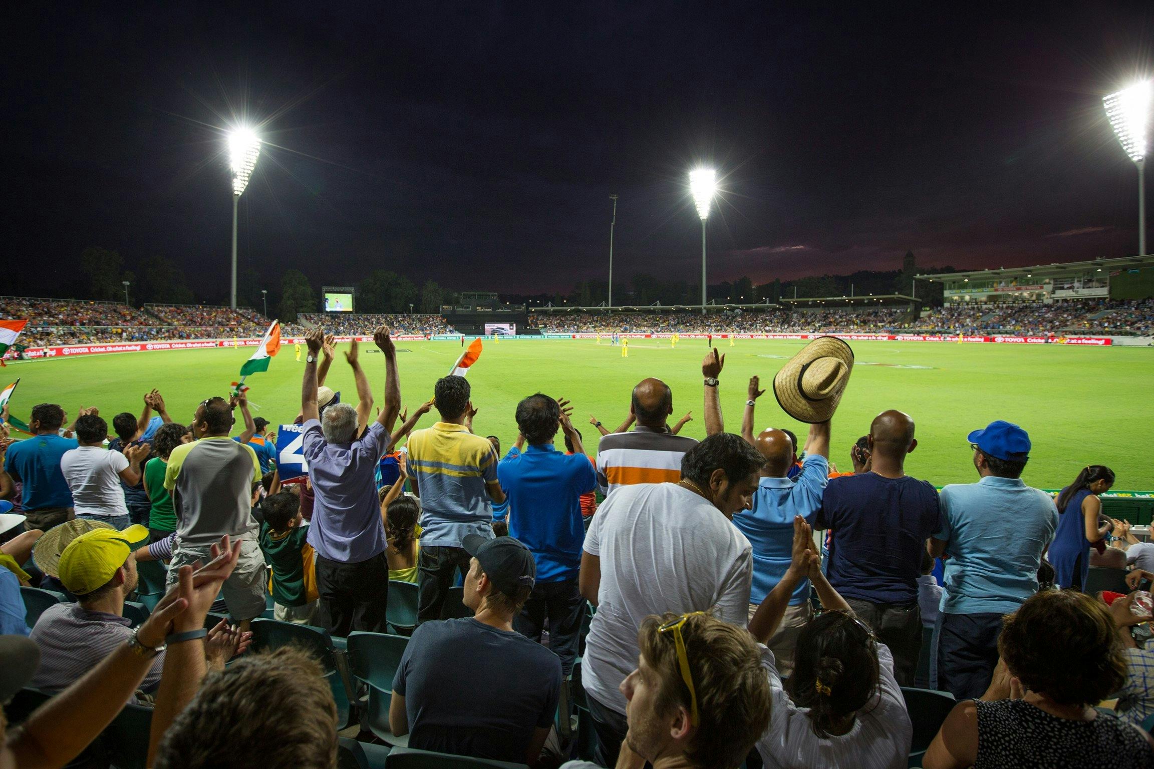 Cricket match under the lights at Manuka Oval