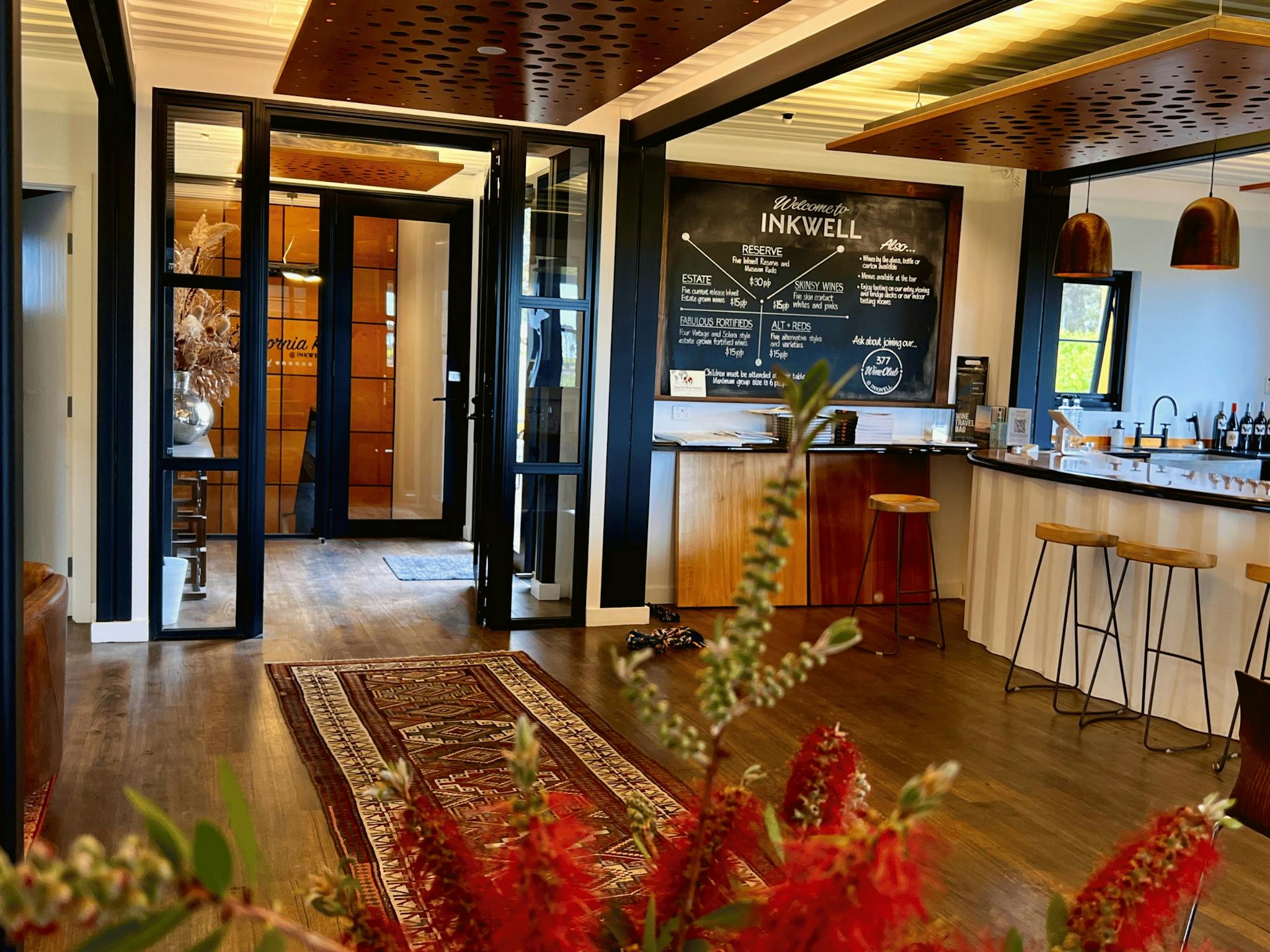 Made from recycle shipping container and other recycled materials, Inkwell Wines tasting room
