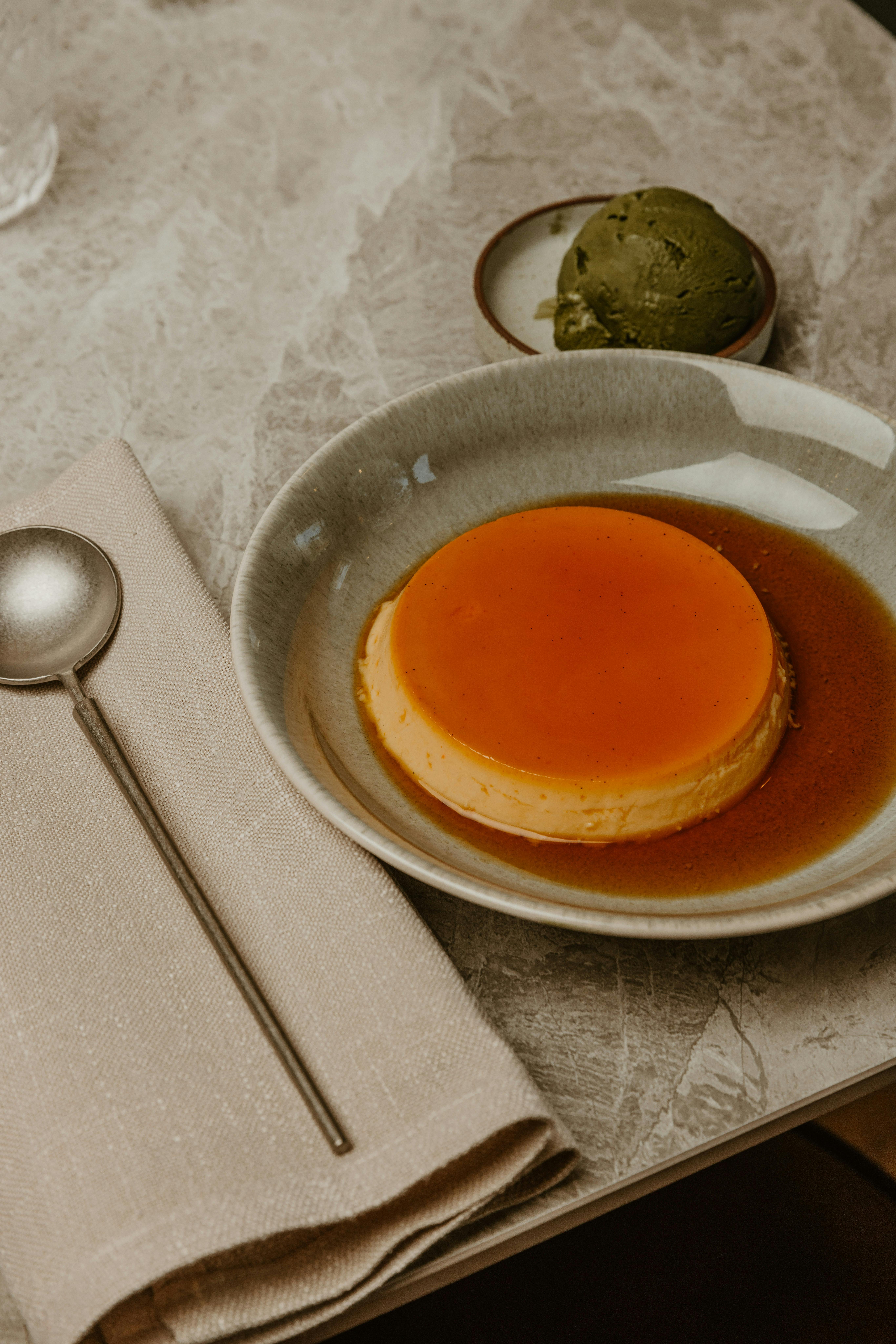 orange and chilli flan with matcha ice cream