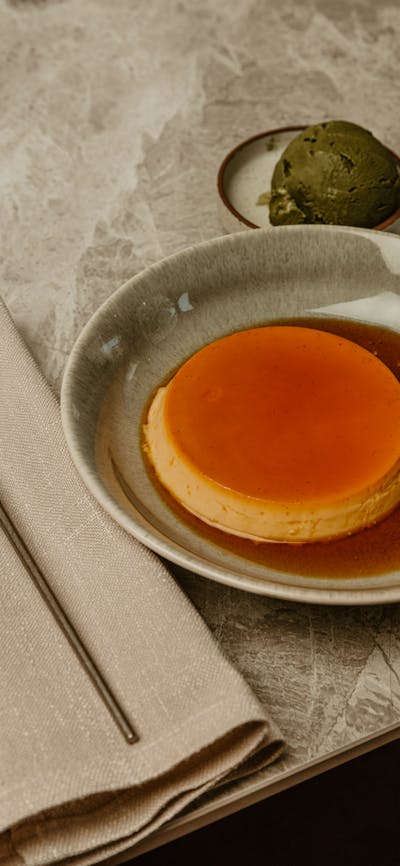 orange and chilli flan with matcha ice cream