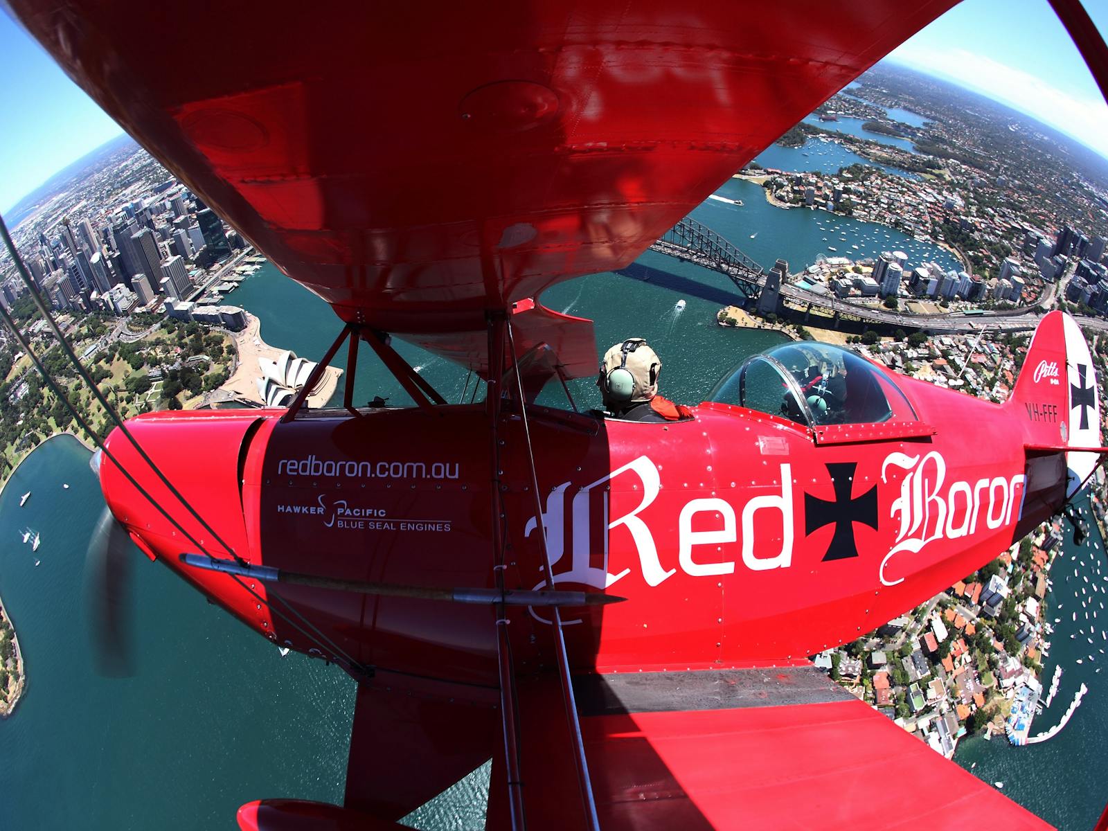 Red Baron biplane over Sydney Harbour