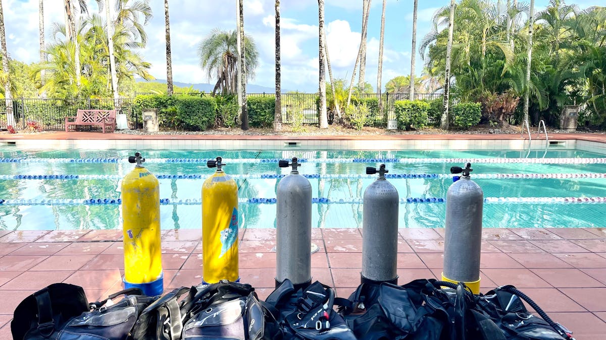 scuba tanks by the pool for open water training in Port Douglas, Great Barrier Reef