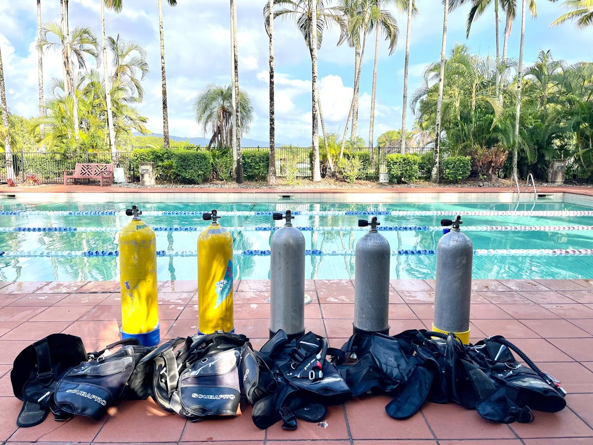 scuba tanks by the pool for open water training in Port Douglas, Great Barrier Reef