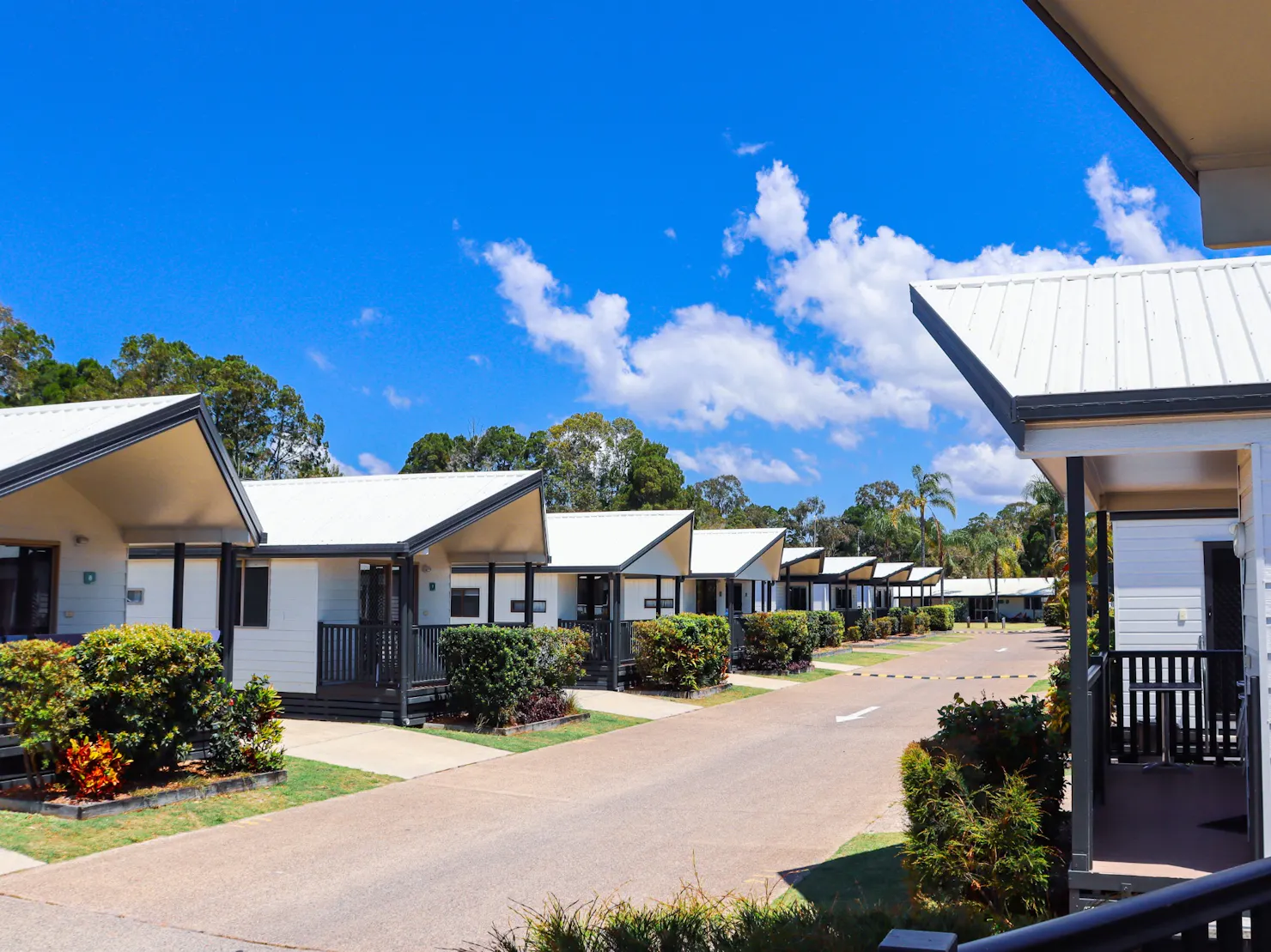 Rainbow Beach cabins on a blue sky day