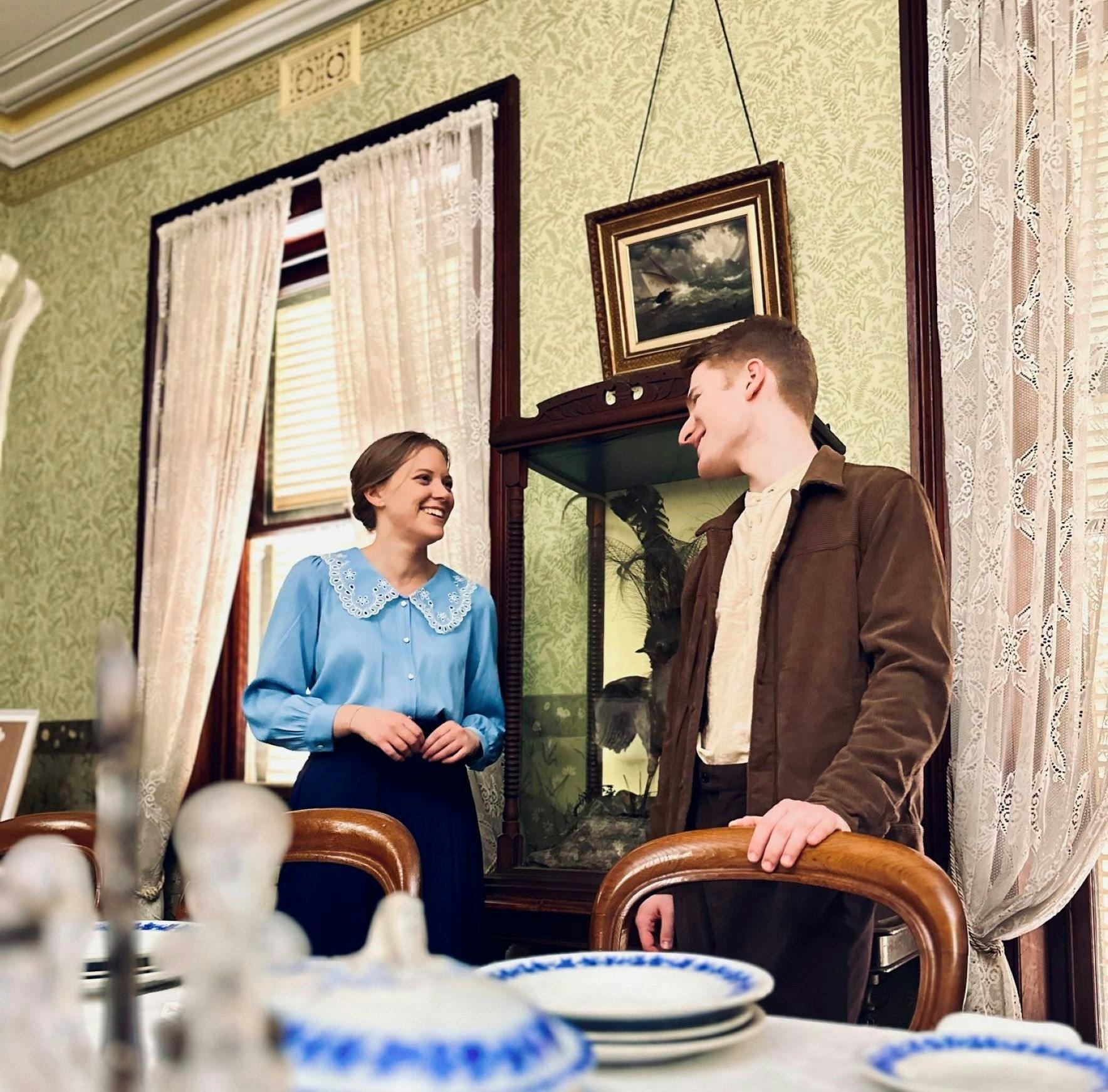 Two people inside the heritage listed Grossmann House