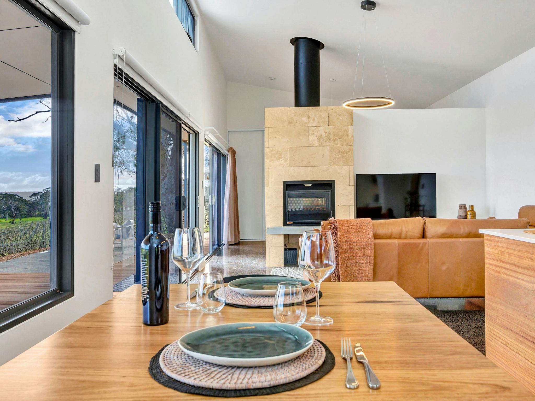 View from the dining table to the double sided fireplace