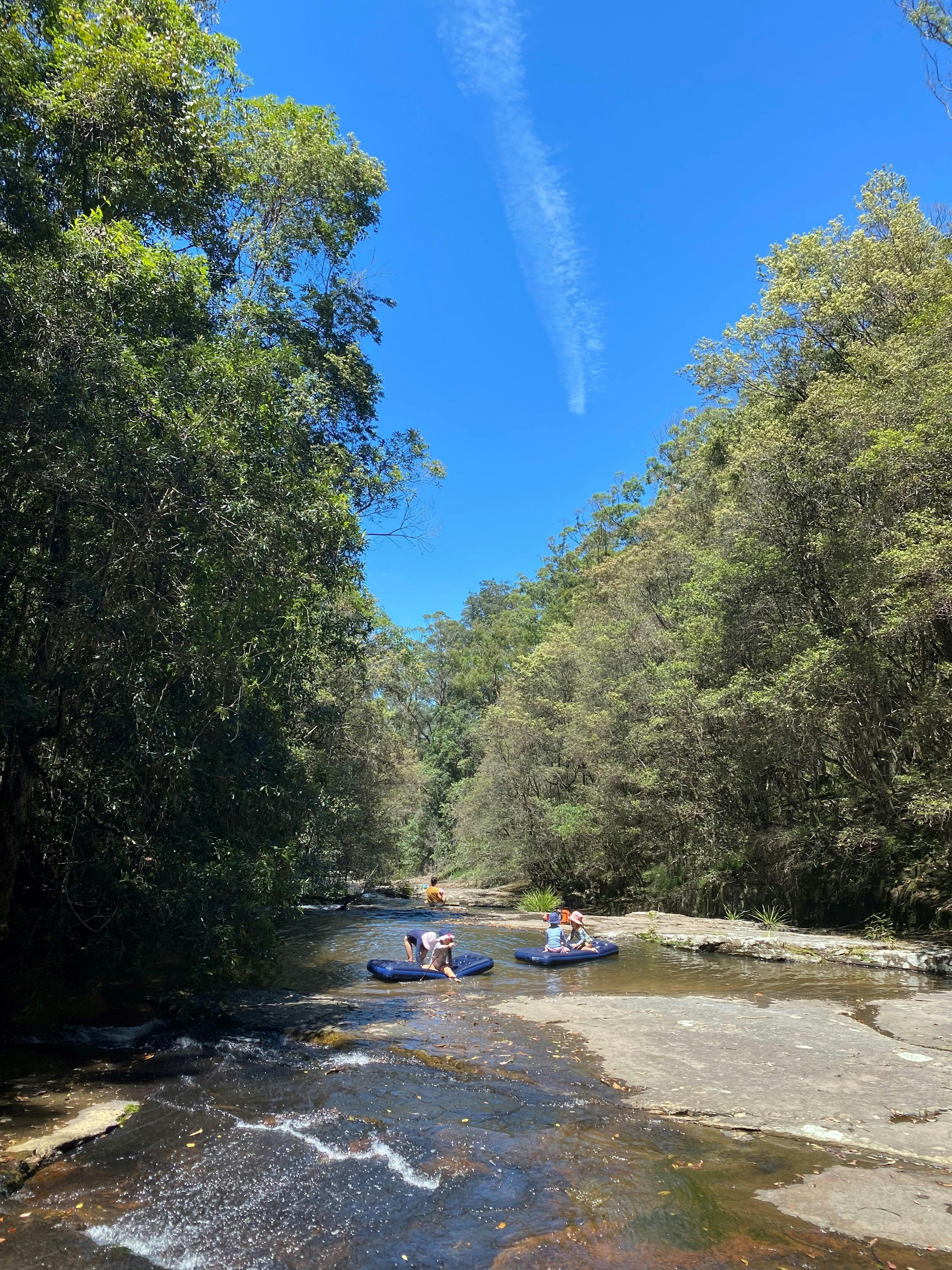 lilo floating down creek