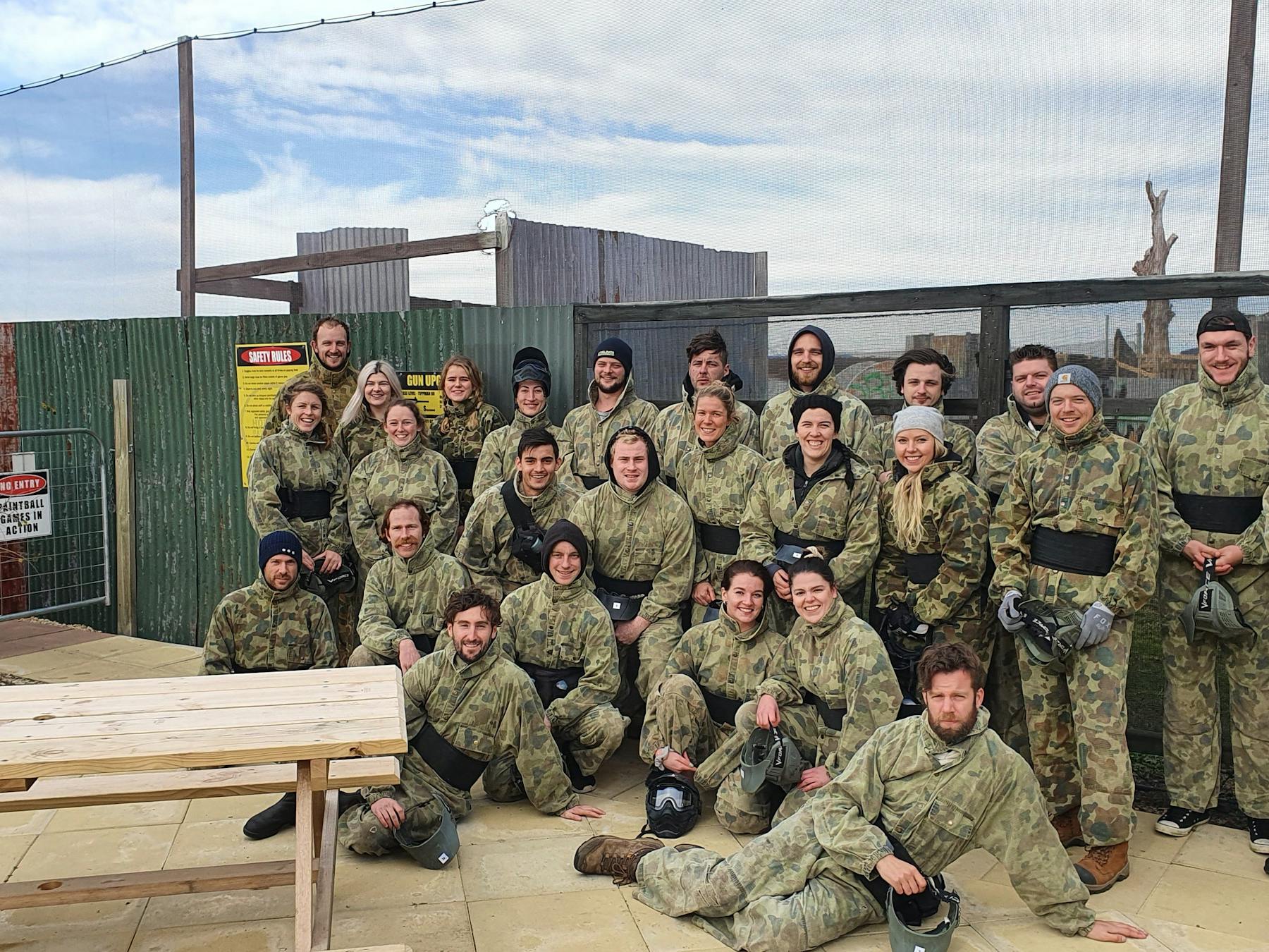 A big birthday group before headin out to play a few hours of paintball games
