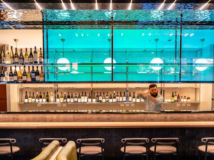 This neon-lit bar will enhance your experience with our great drinks to start off with.
