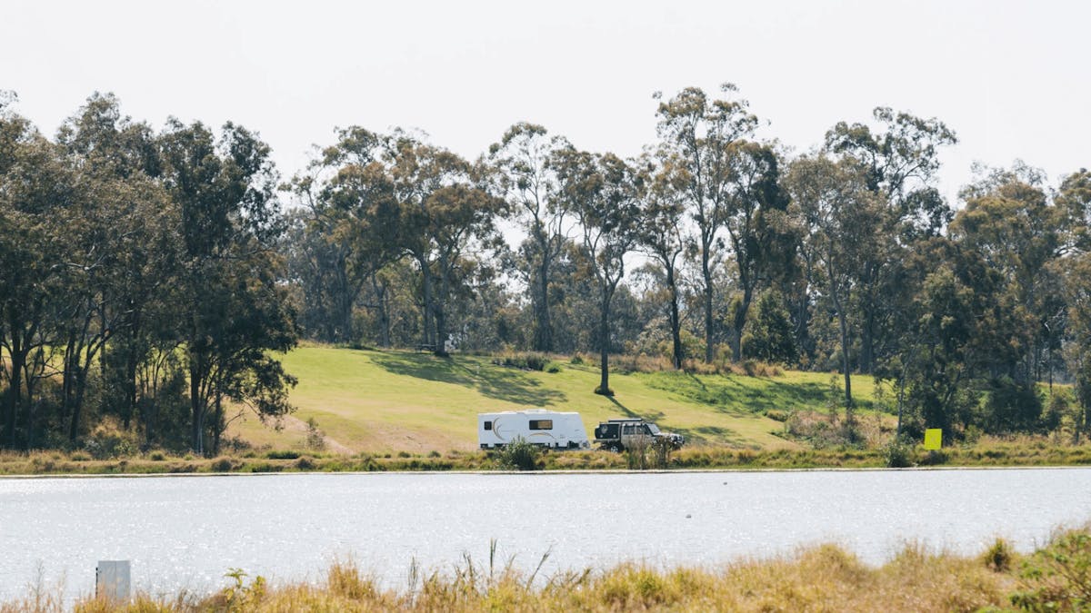caravan on the other side of a lake in Queensland