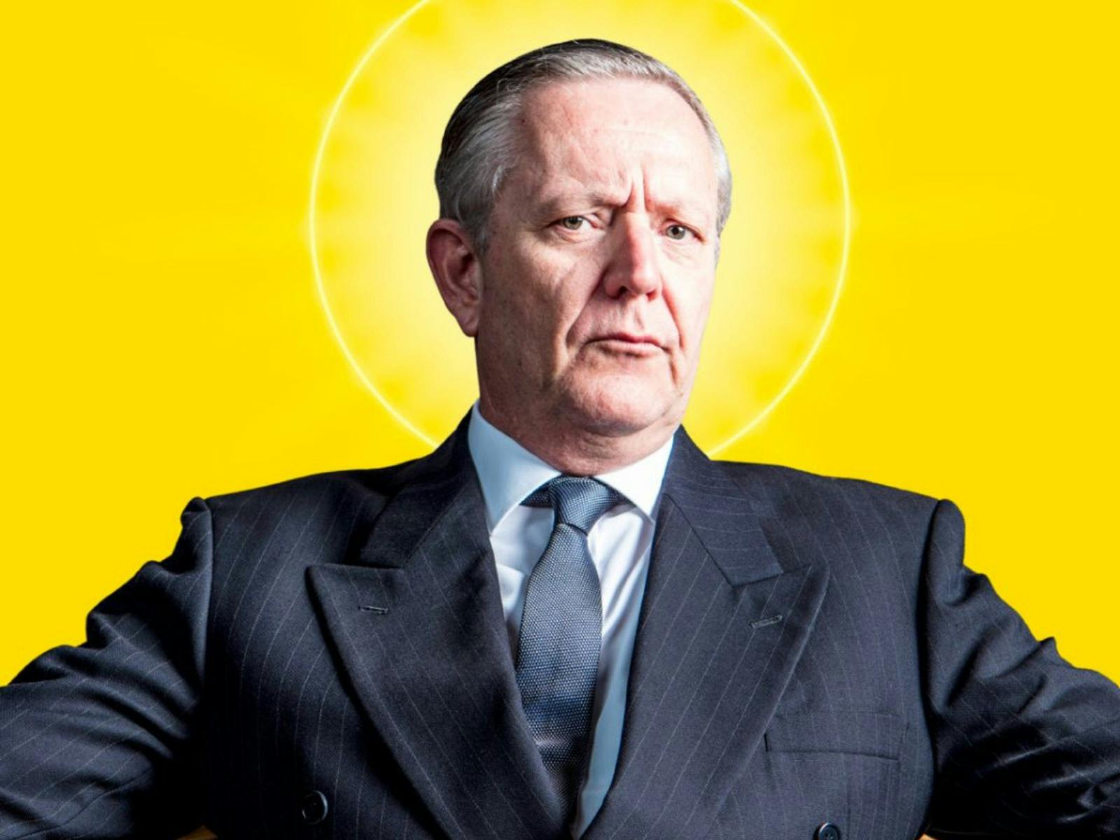 man in suit sitting
