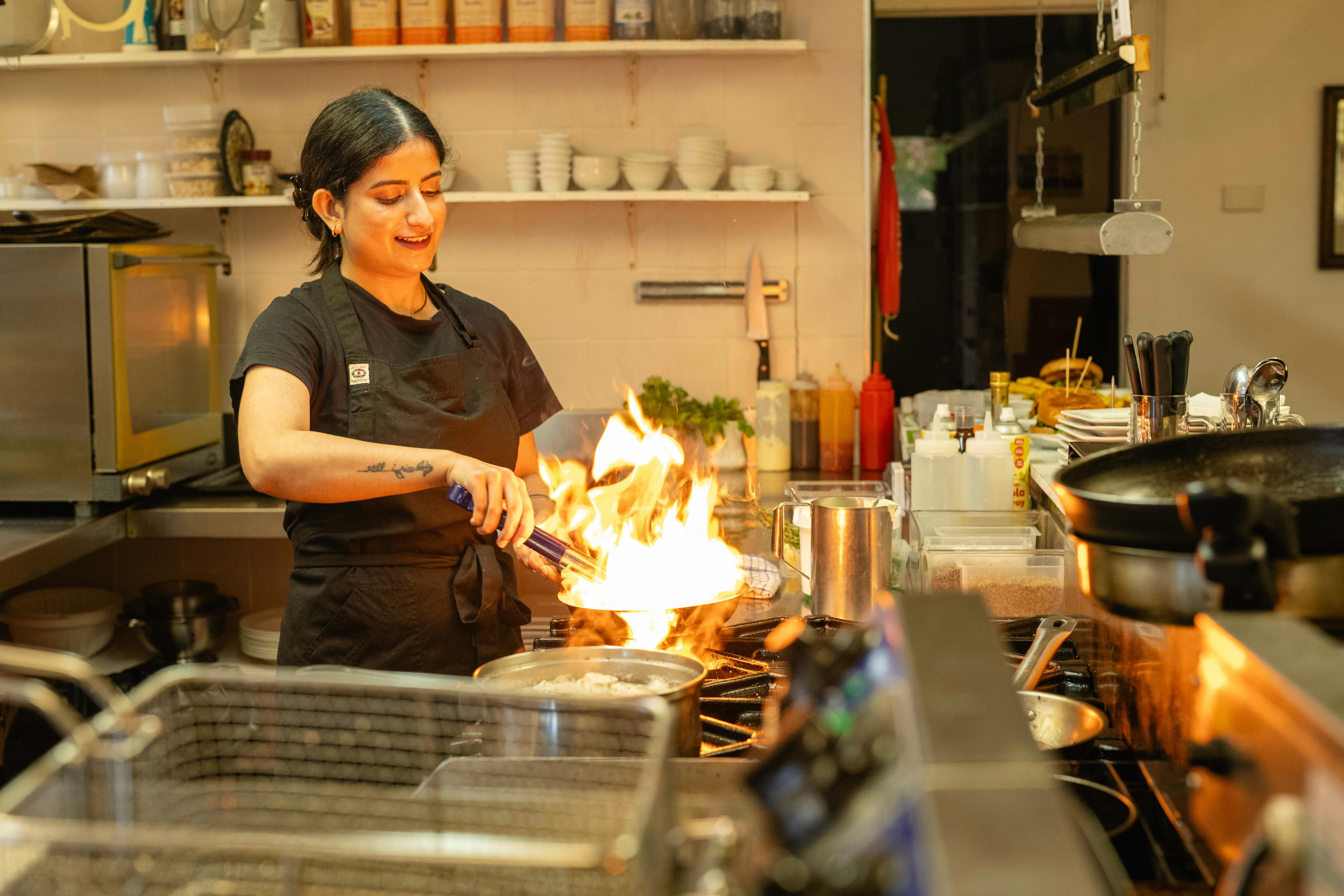 Chef Prab at Maydena Eats showcases culinary skills with flair, creating delicious, fresh dishes.