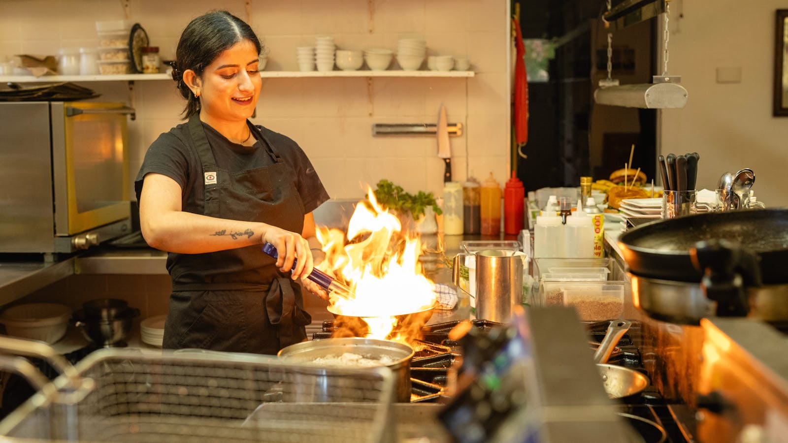 Chef Prab at Maydena Eats showcases culinary skills with flair, creating delicious, fresh dishes.