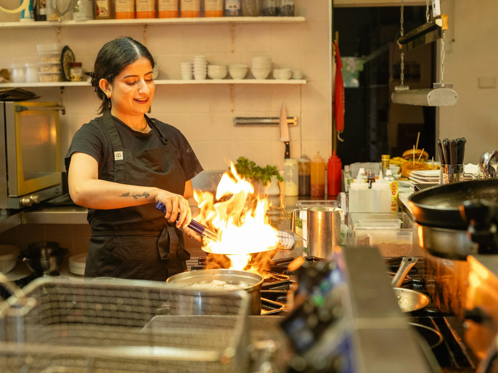 Chef Prab at Maydena Eats showcases culinary skills with flair, creating delicious, fresh dishes.